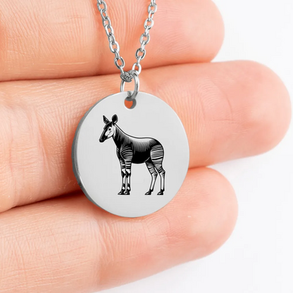 Personalized Okapi charm necklace with intricate design, a stunning piece of jewelry.