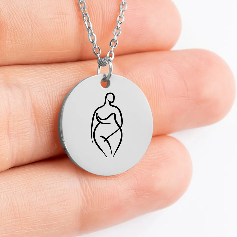 Custom feminist jewelry: body positive medallion necklace with intricate design