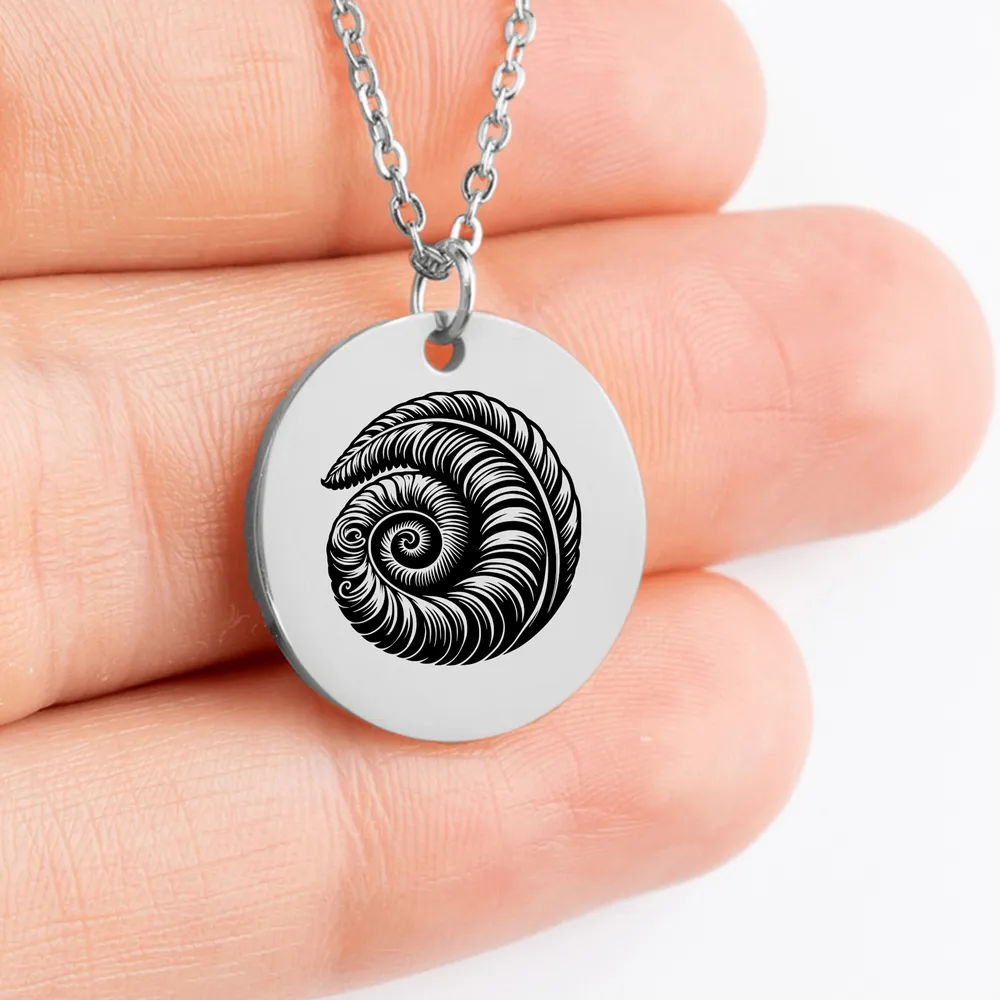 Beautiful Koru charm necklace with custom engraving