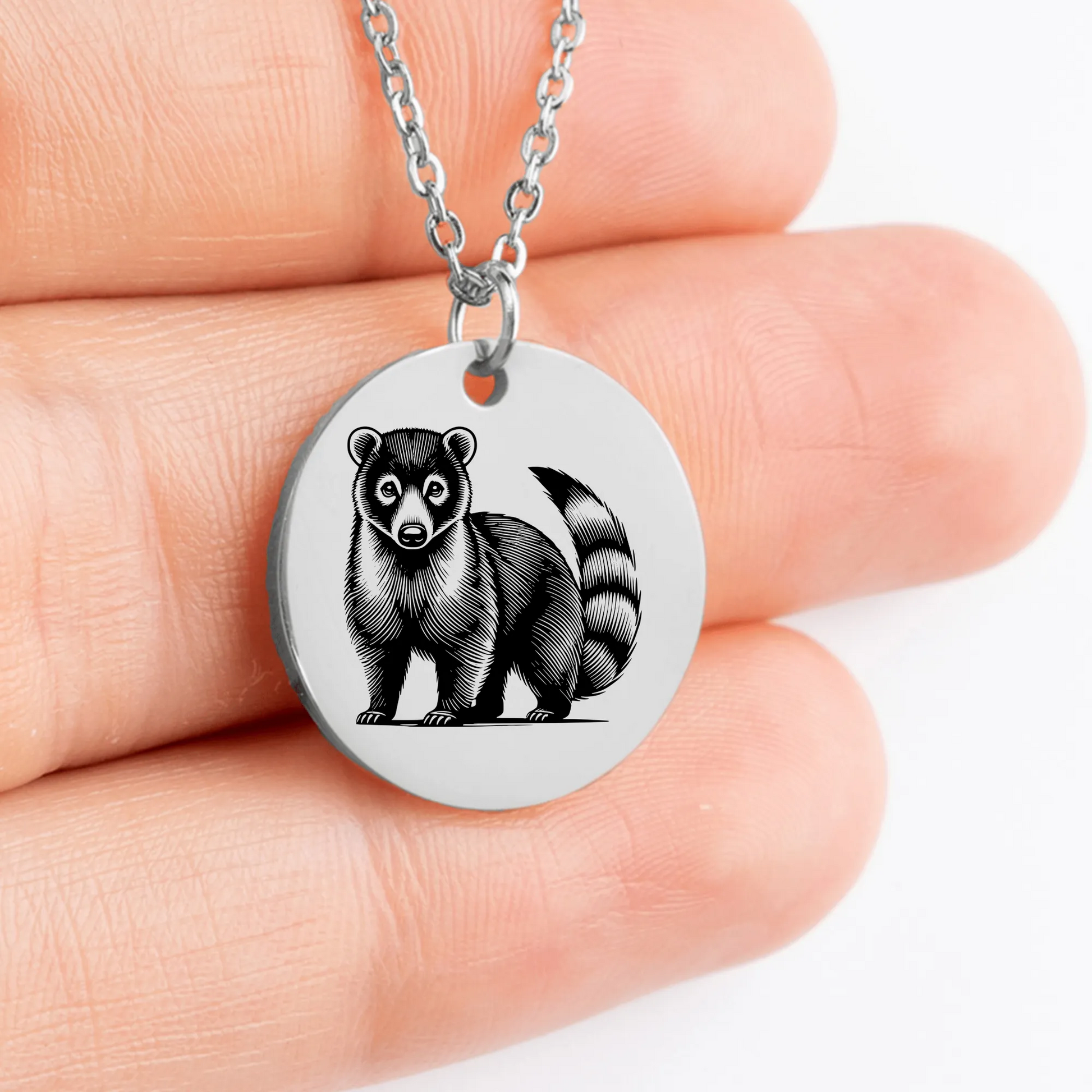 Elegant coati charm pendant on a delicate chain, a beautiful accessory