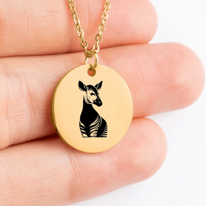 Personalized Okapi charm necklace with intricate design, a stunning piece of jewelry.