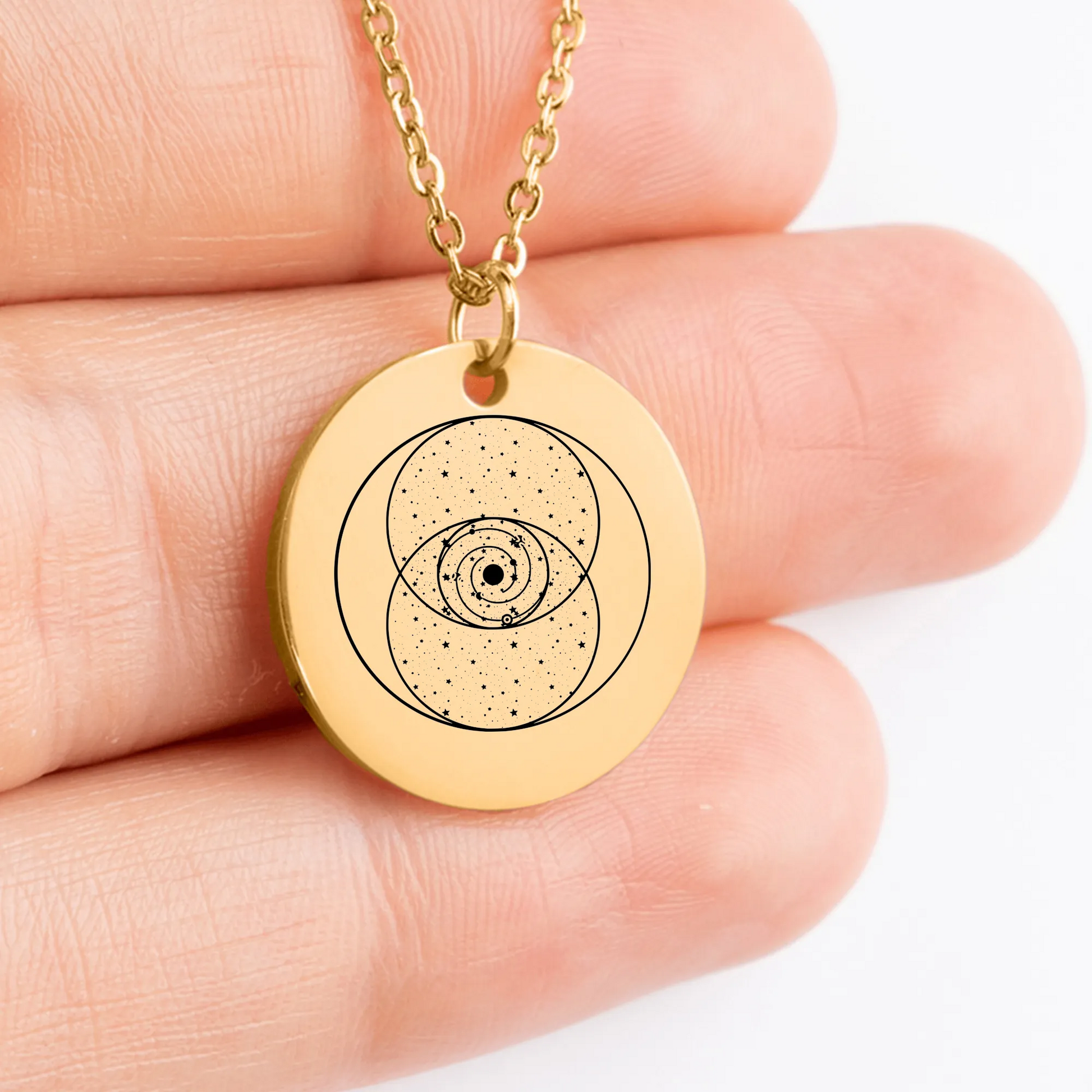 Engraved Vesica Piscis coin charm on stylish medallion accessory